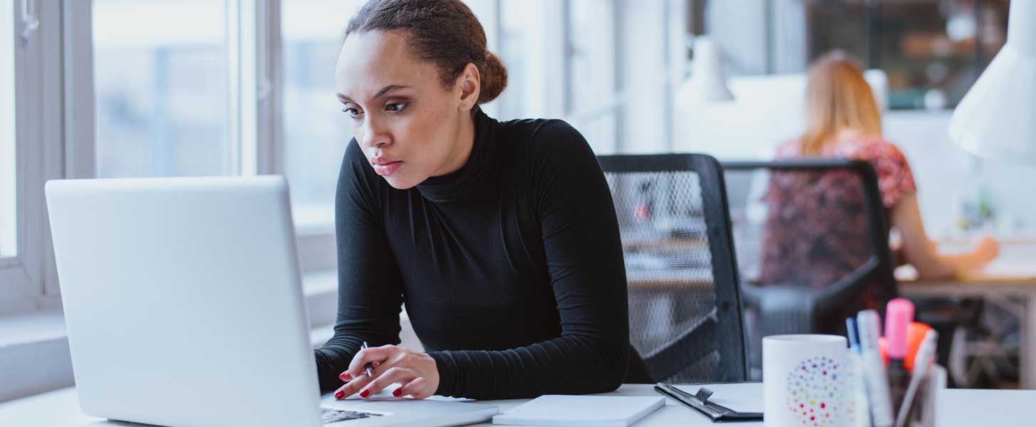 a woman working on a laptop