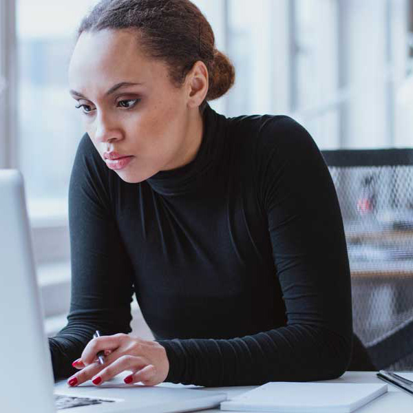 a woman working on a laptop